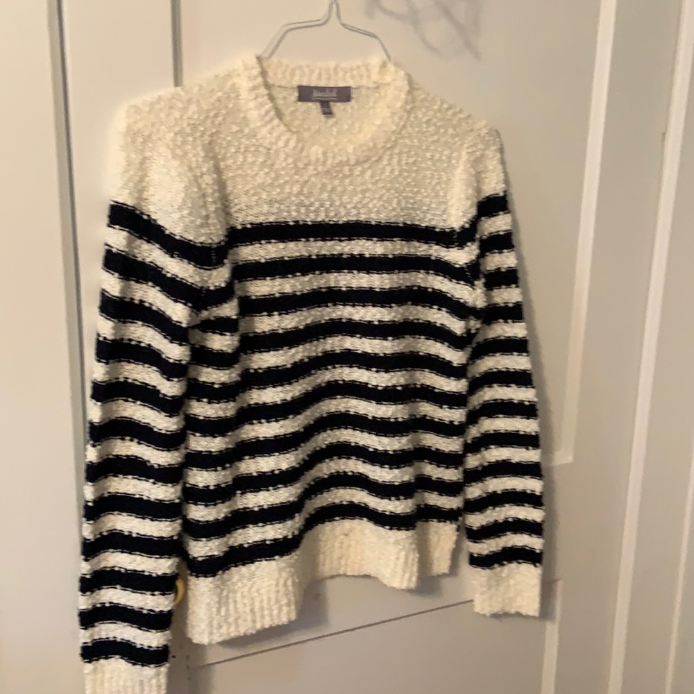 Never worn marked sweater, size small. New condition.